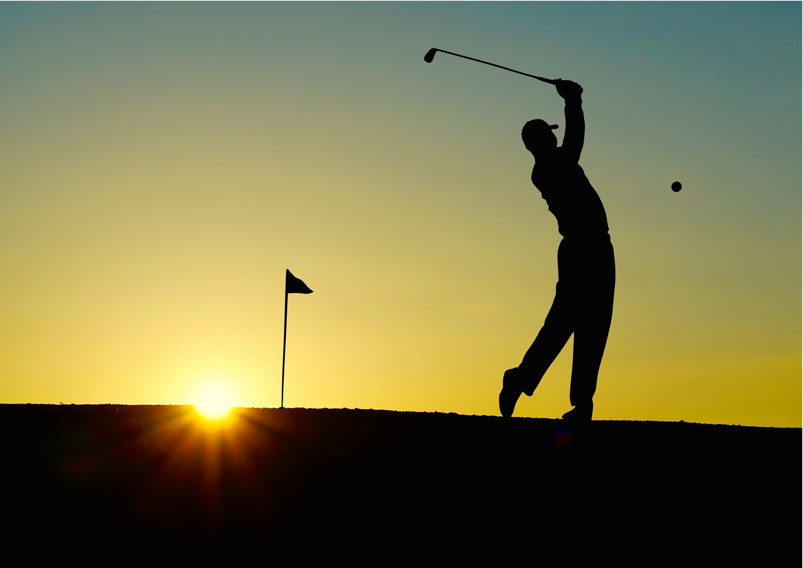 Image of a golfer swinging.
